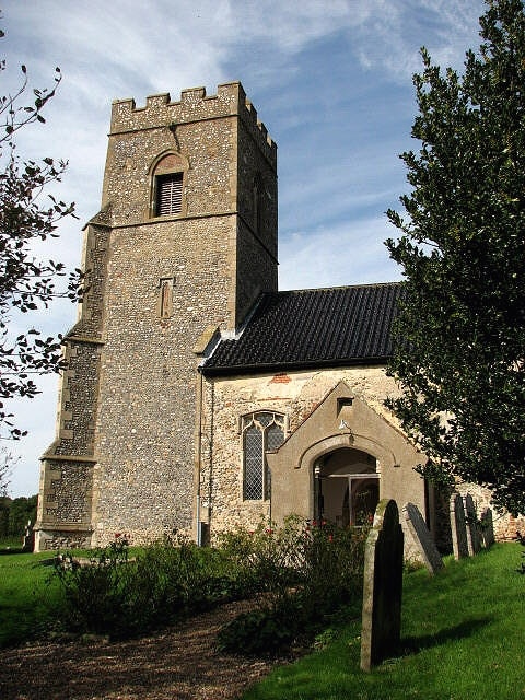 St Mary's church - porch and tower. St Mary's church has a late medieval tower and a Saxon doorway; the chancel dates from the late 13th century as is evidenced by the angle piscina > 831132 which is still in place. The interior was, however, extensively restored in the 19th century; medieval survivals are the C15 font, carved with arms of the Valoines family > 831134 and the original roof > 831127 - dating from the same time. The church is open every day. For more information see: http://www.norfolkchurches.co.uk/barney/barney.htm