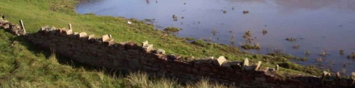 Photo "Flooding on the River Ehan" by Raymond Knapman (Creative Commons Attribution-Share Alike 2.0) / Cropped from original