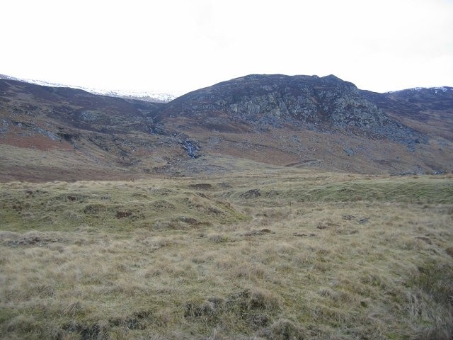 Creagan Soilleir. Craggy hillside above Laggan. The end of the improved farmland.