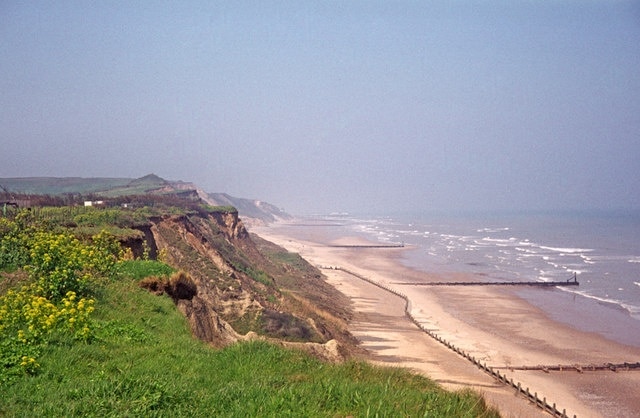 Looking towards Cromer from Overstrand, Norfolk Here we have the beach between Overstrand and Cromer with Cromer Pier on the horizon and the Cromer lighthouse just visible to the left of the Pier.