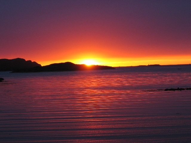 Sunset. Looking out across Bunnesan Harbour.