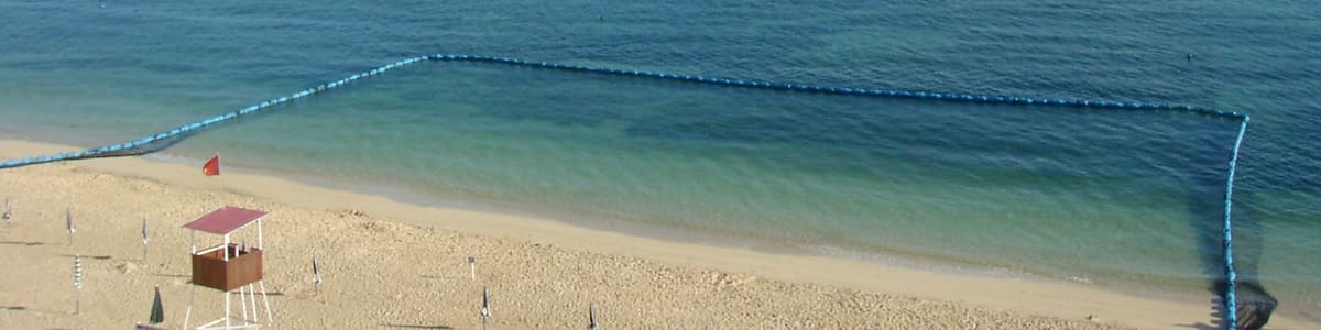 Photo "On a Summer Morning,UPPAMA Beach, Nakijin" by Hikomi Moneru (Creative Commons Attribution 3.0) / Cropped from original