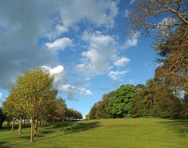 The grounds of Barnsdale Hall Hotel An avenue of trees surrounding the pitch and putt course.