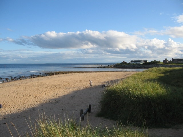 Brora north beach. A view looking south along the small beach by the golf links towards the mouth of the River Brora.