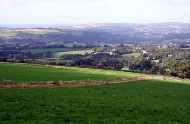 Aberteifi over the fields The road between Rhoshill in the east and Eglwyswrw in the west runs along the northern Preseli escarpment providing spectacular views over the Teifi valley. In this one, looking NNW, the town of Cardigan and the Teifi estuary can be seen in the distance.