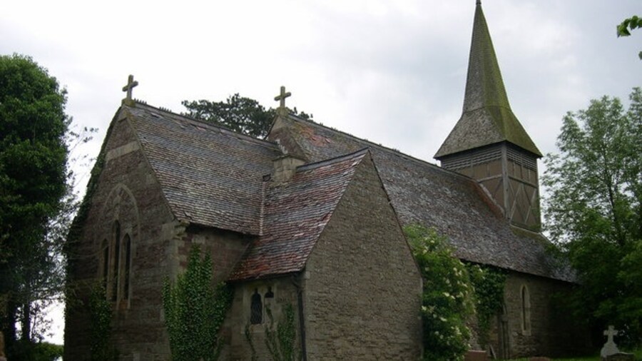 Photo "The former parish church of St Andrew, Wolferlow, Herefordshire, seen from the northeast. When this photo was taken the building was closed, had holes in its roof and was for sale." by Philip Pankhurst (Creative Commons Attribution-Share Alike 2.0) / Cropped from original