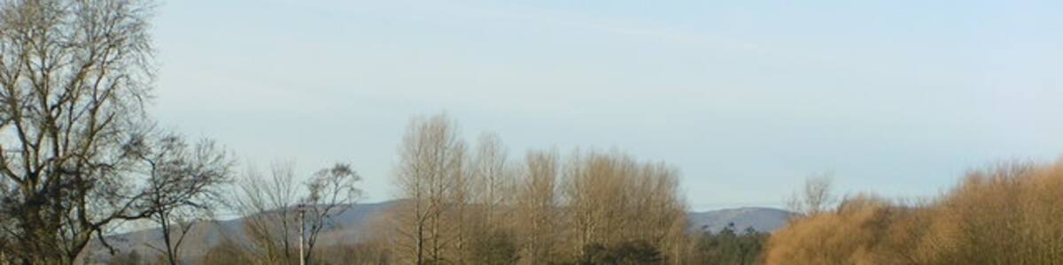 Photo "Borderline Angus on the left bank, Aberdeenshire on the right, the River North Esk marks the county boundary" by Karen Vernon (Creative Commons Attribution-Share Alike 2.0) / Cropped from original