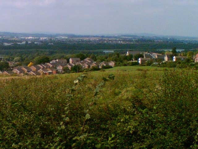 Long Lane, Killamarsh. View NNW from Long Lane, Killamarsh across Killamarsh village. The lakes and woodland in the mid-distance are Rother Valley Country Park.