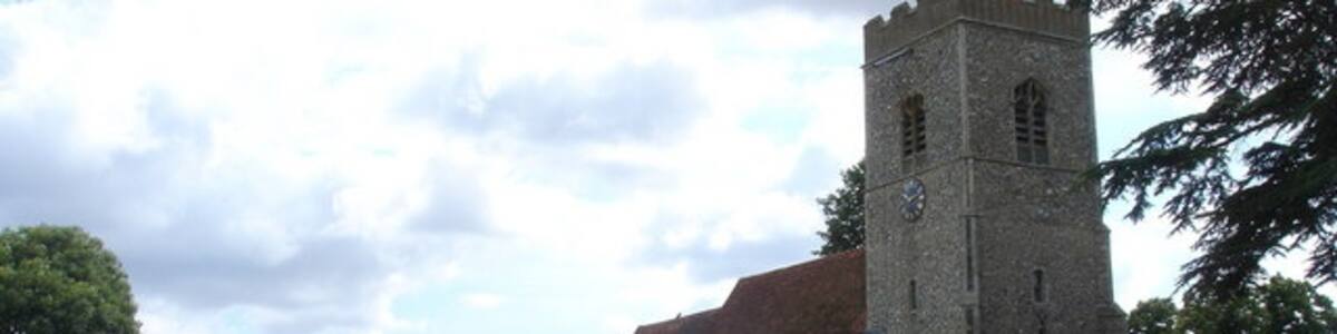 Photo "St John's parish church, Great Whenham, Suffolk, seen from the west" by Oxymoron (Creative Commons Attribution-Share Alike 2.0) / Cropped from original