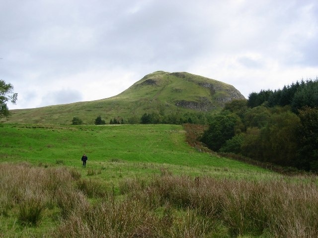 Dumgoyne. A major landmark, being an individual peak on the otherwise flat topped expanse of the Campsies. A neck of resistant volcanic rock left after softer stuff was washed away.