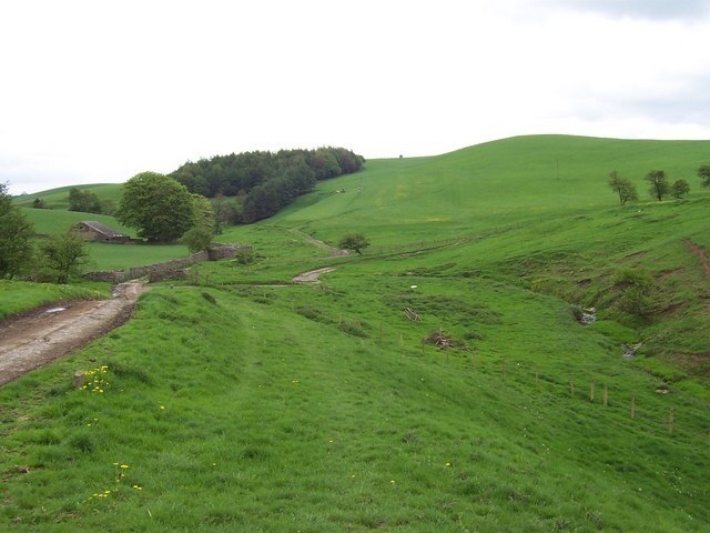 Mallardale. Tiny secluded valley, surrounded tightly by rounded green whale-backed hills.