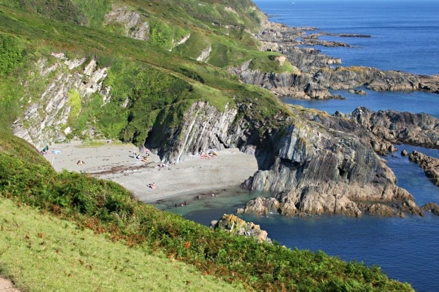 Lansallos Cove This sheltered cove is seen here from the coast path to the west of the cove.