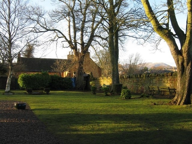 The Old Inn at Roslin Viewed from the grounds of the Rosslyn Chapel, with the Pentland Hills in the winter sun in the distance.