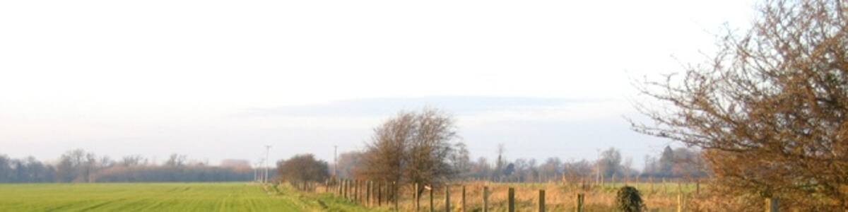 Photo "Disused railway and footpath, Histon to Westwick, Cambs. The disused railway crosses the square from southeast to northwest." by Rodney Burton (Creative Commons Attribution-Share Alike 2.0) / Cropped from original