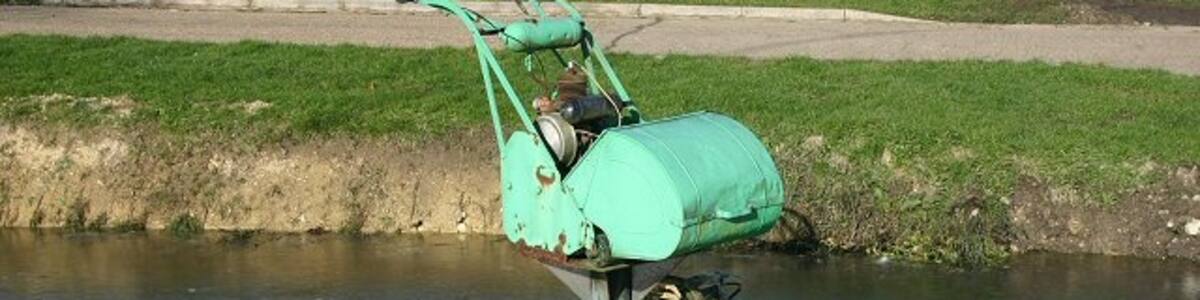 Photo "Tools of the trade In the pond outside Pettitt Engineering, Hargrave, where lawnmowers and chainsaws are repaired and serviced." by Bob Jones (Creative Commons Attribution-Share Alike 2.0) / Cropped from original