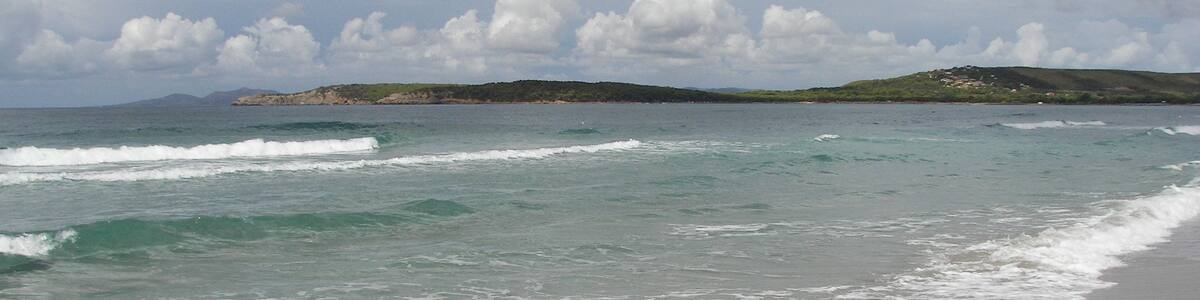 Photo "Spiaggia di Porto Pino - S. Anna Arresi (CI)" by gian luca bucci (Creative Commons Attribution 3.0) / Cropped from original
