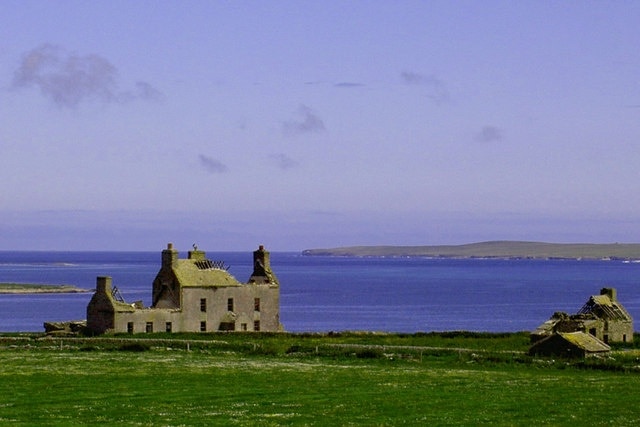 House of Broch, Westray Last inhabited about 30 years ago by the last Laird of Broch Estate. Island of Papa Westray in background.