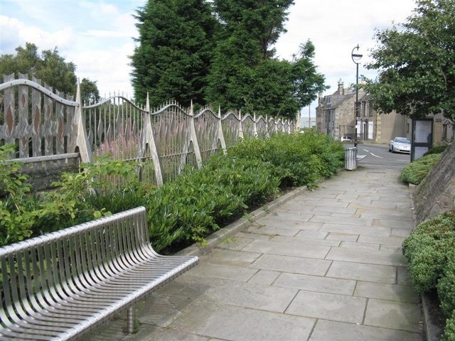 Decorative railings, High Street, Loanhead Near the site of the old railway station and town centre there are some fine examples of decorative street furniture - seats, railings, tree protectors and sculpture.