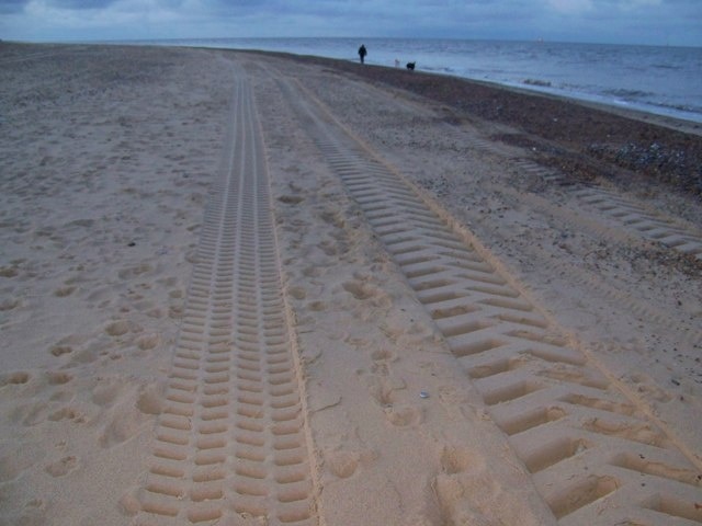 Tracks in the sand, Great Yarmouth Looking along North Beach in the evening light.