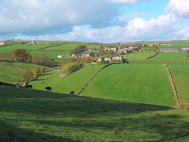 Newsholme. The village of Newsholme is tucked out of the way on a dead end lane. Seen from Slack Lane looking northwestwards.