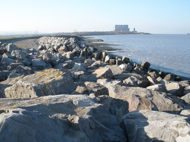 Coastal defences, west of Stolford; Hinkley Point B Nuclear Power Station in the distance