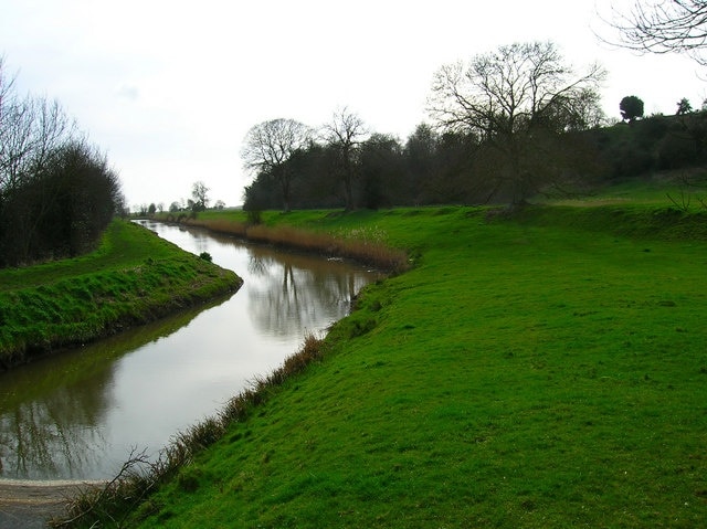 Royal Military Canal The section of canal that runs from the Brede to the coast at Cliff End. The wooded area lining the slopes of Iham Hill to the right is known as The Rookery.