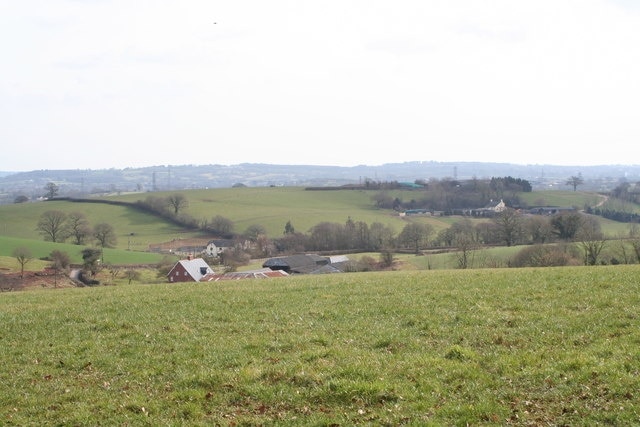 Field above Clapp Mill Farm The buildings on the hillside beyond are those of Townhill Farm at Westwood.