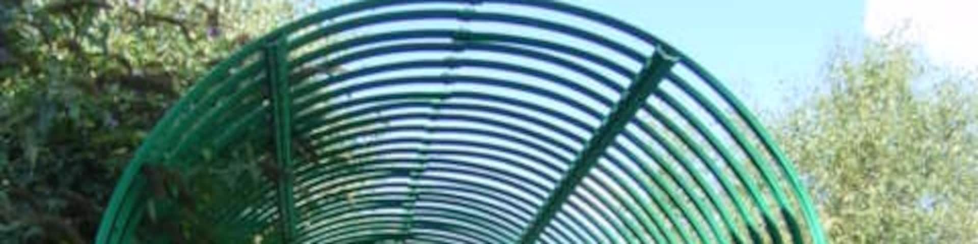 Footbridge over Liverpool-Manchester Railway. An unusual view of the footbridge over Liverpool-Manchester railway line at Hunts Cross near the Halewood Triangle Country Park.