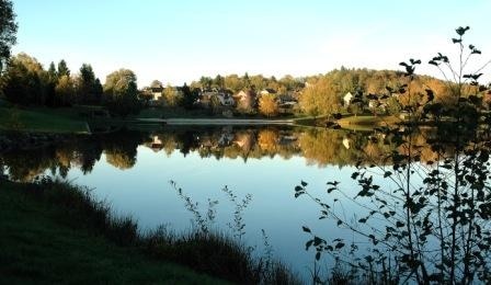 View of the french town of Meuzac, in the Haute-Vienne (Limousin) region, seen from the La Roche Lake.