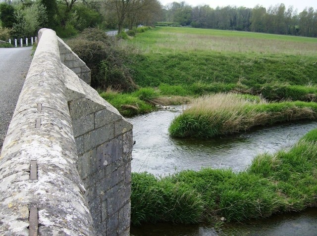 Collyweston Bridge Looking over the parapet of Collyweston Bridge from the Northamptonshire side of the River Welland to the Rutland side.