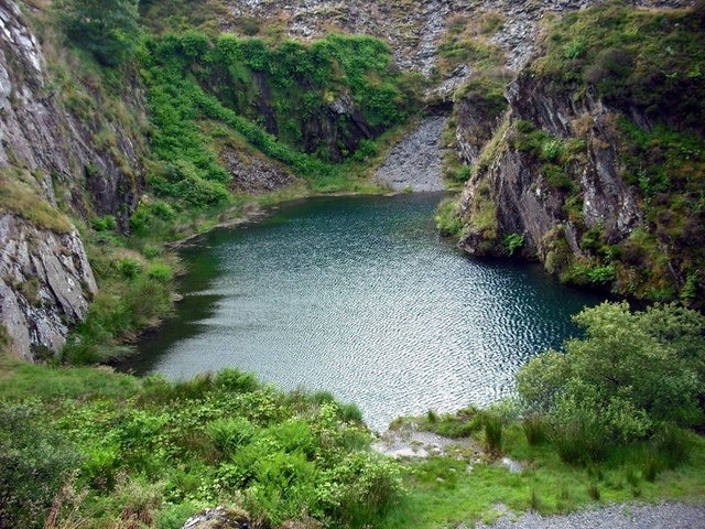 Pool in the quarry The excavated slate working here became a reservoir of water that was used to drive a turbine below.