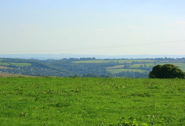 East of south from Bath Road, Colerne The pasture soon drops into the valley, with Lid Brook at the bottom. Box is on the far hillside to the left.