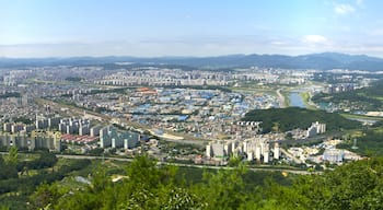 Cityscape of the metropolitan city of Daejeon, South Korea. This is a panorama of three photograhs stitched together using Hugin. The photographs were taken from Bonghwangjeong at Gyejoksan, a nearby mountain, using a 20mm focal length