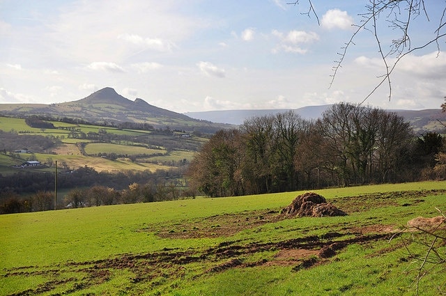 Farmland in Herefordshire The land in the foreground is in England whilst the rest is in Wales. The distinctive hill is Ysgyryd Fawr.