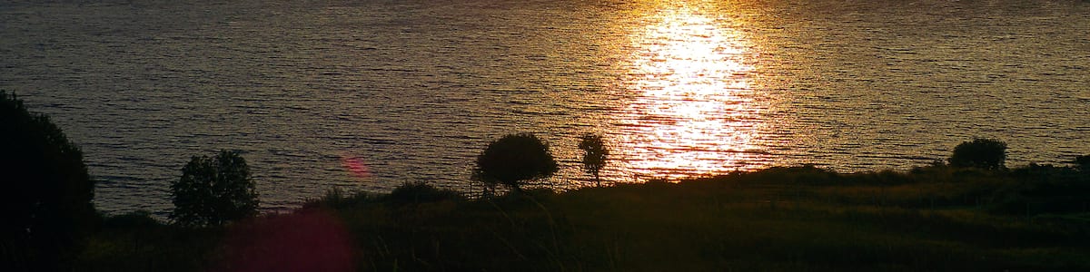 Photo "Sunrise" by Alexander Reuss (Creative Commons Attribution 3.0) / Cropped from original