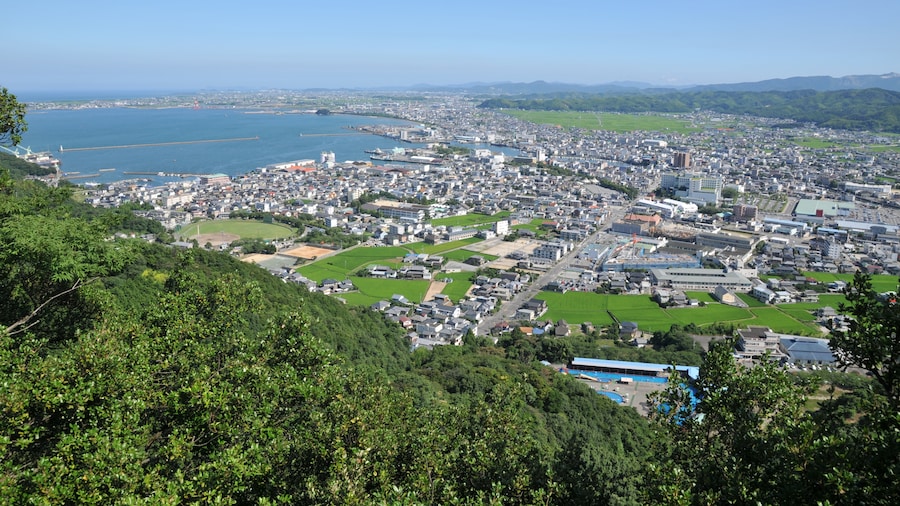 Photo "Komatsushima city and Anan city view from Hinomine jinja" by Reggaeman (Creative Commons Attribution-Share Alike 3.0) / Cropped from original