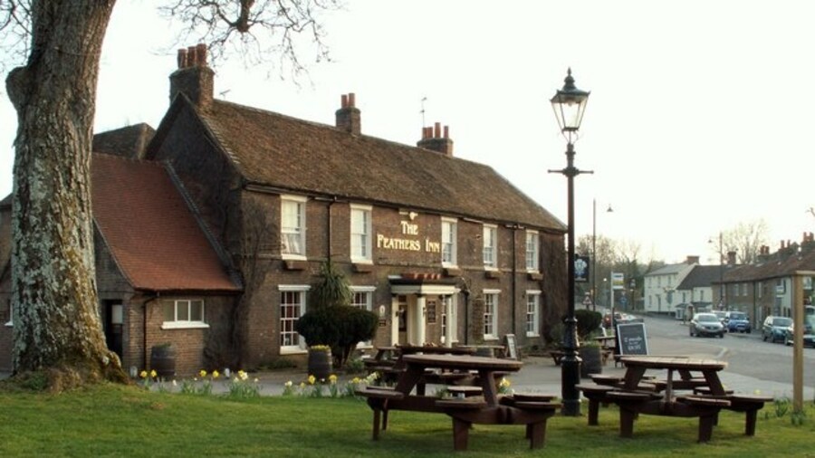 Photo "'The Feathers Inn' at Wadesmill This was originally a 17th century coaching inn and called 'The Princes Arms' in the early 1600s." by Robert Edwards (Creative Commons Attribution-Share Alike 2.0) / Cropped from original