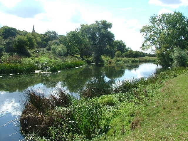 The Great Ouse near Harold. you can see the spire to St Nicholas's Church