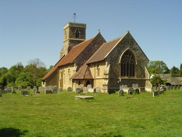 Brantham St Michael's church, near to Brantham, Suffolk, Great Britain. The moment you approach Brantham church you are struck by the lychgate with its shingled roof and carved roses. The church itself is 14th c. but has been much restored and added to, giving it an especial charm. The church has an original John Constable painting, painted in his early years and presented to the church as an altarpiece in 1804.