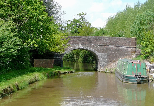 Bridge No 54, near Cheswardine, Shropshire. Westcottmill Bridge on the Shropshire Union Canal. The bridge is purely for farmers' access and a public footpath from the double bend on Westcott Lane on the left to Cheswardine on the right (1200 metres) where the Red Lion pub with its own microbrewery can be found. N.B. The footpath no longer goes through Westcott Mill Farm, but instead follows the concrete road adjacent to the canal.