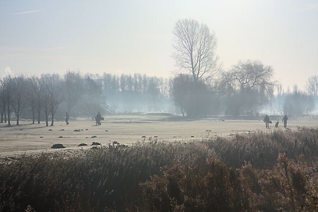 Early morning golfers. Mist, frost and the occasional mole hill are the natural hazards on the Suffolk golf course at Fornham St Genevieve. But the early morning golfers are not to be deterred.