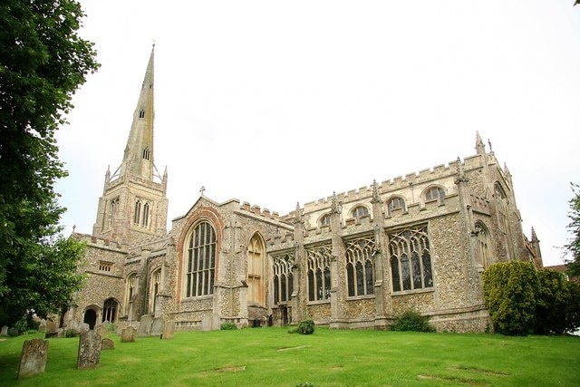 St.John the Baptist's church, near to Thaxted, Essex, Great Britain. Magnificent Perpendicular parish church in Thaxted, seen from Stoney Lane entrance