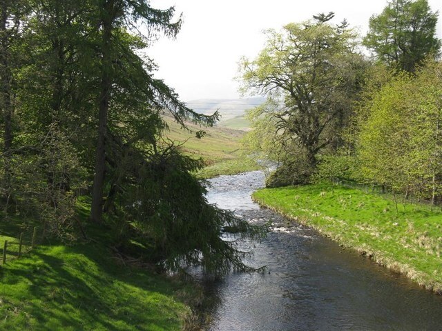 The Megget Water at Cappercleuch. A spring view from the A708, just before the burn flows into St Mary's Loch. For a winter view see 324427.