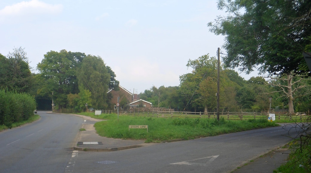 One of a series of photos chronicling the development of Crawley New Town's 14th residential neighbourhood, Forge Wood. This eastward view shows the junction of Radford Road and Steers Lane as it appeared in September 2014, prior to major roadworks which will drastically change its appearance. Radford Road forms the northern limit of the Forge Wood development.