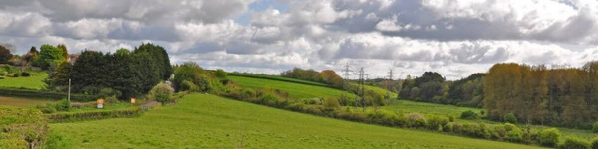 Photo "The Kenson valley - Llancadle" by Mick Lobb (Creative Commons Attribution-Share Alike 2.0) / Cropped from original