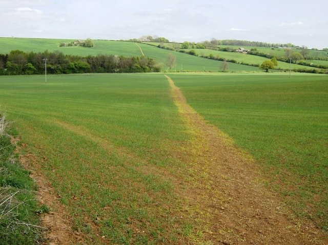 Footpath across England Looking north-east from the point at which this footpath meets the road in Farthingstone. This footpath is the Macmillan Way, a 290-mile costs-to-coast path from Lincolnshire (in front) to Dorset (behind). Oh that they were all as clear on the ground as this.