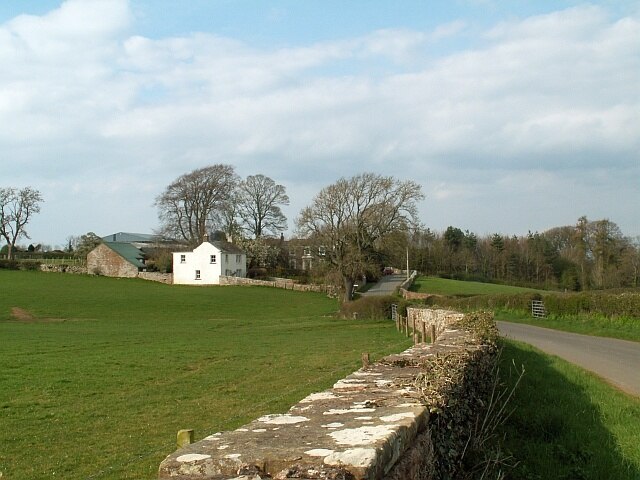 View of East Curthwaite A hamlet in a predominantly agricultural area.