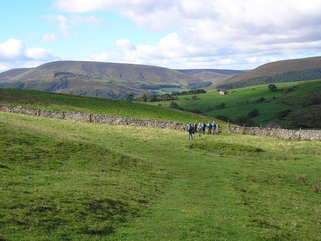 Walkers in Bowland A footpath near Dunsop Bridge. Staple Oak Fell is in the distance.