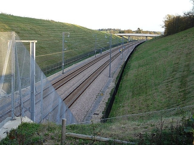 Channel Tunnel Rail Link. Looking SE from bridge 831 on Boughton Road. The railway runs through a deep cutting at this point and, a little way to the west, it runs through a short tunnel but the noise from the nearby M20 motorway is horrendous. The bridge in the distance is Lenham Heath Road.