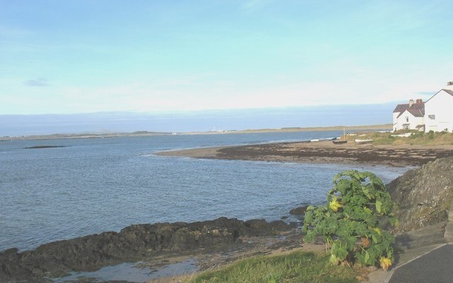 View north-westwards across the beach at high tide